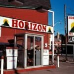 Explore a classic gas station in old Toronto, featuring nostalgic design and vintage pumps.