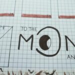 Notebook page featuring 'To the Moon and Back' with creative grid design.