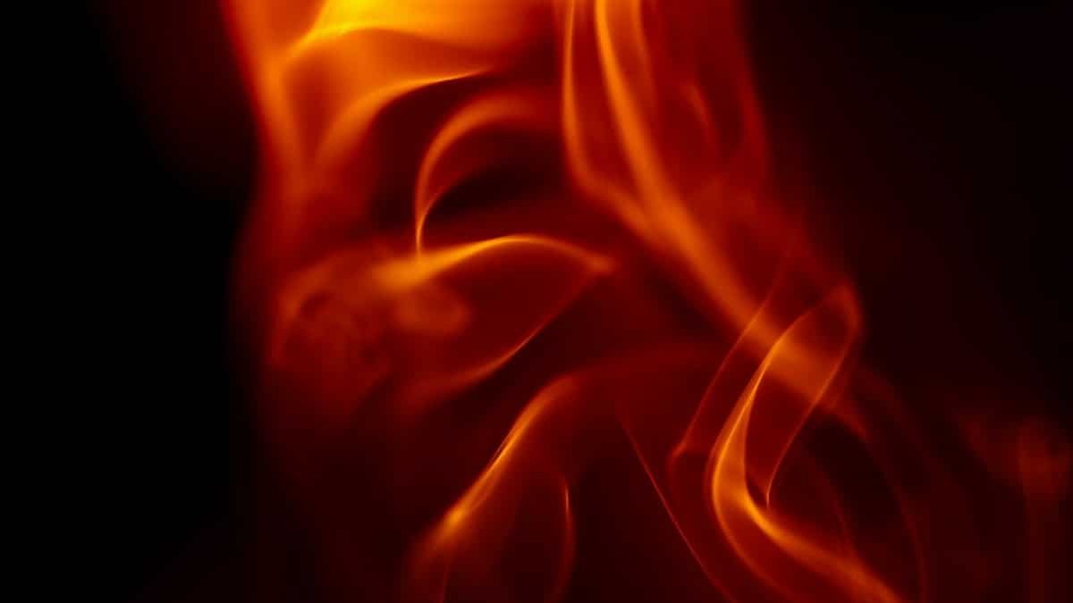 Dynamic close-up of swirling flames showcasing vivid orange and red hues.