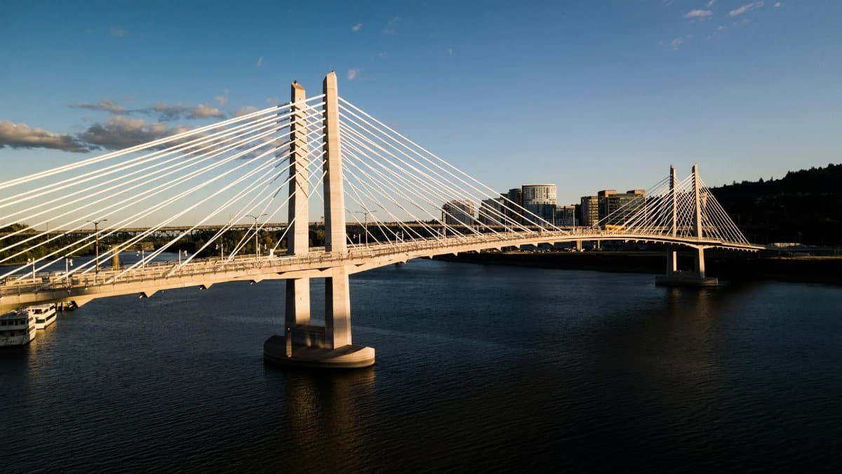 Scenic view of Tilikum Crossing over the Willamette River in Portland, Oregon at sunset.