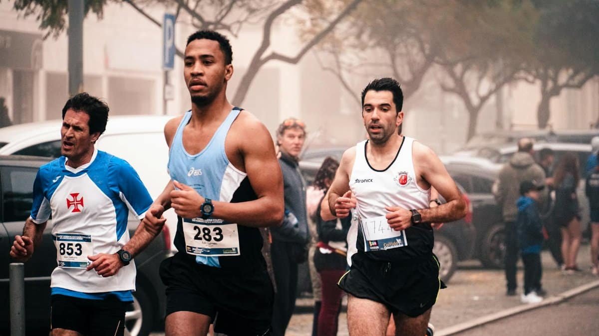 Runners competing in a city marathon, showcasing endurance and athleticism.
