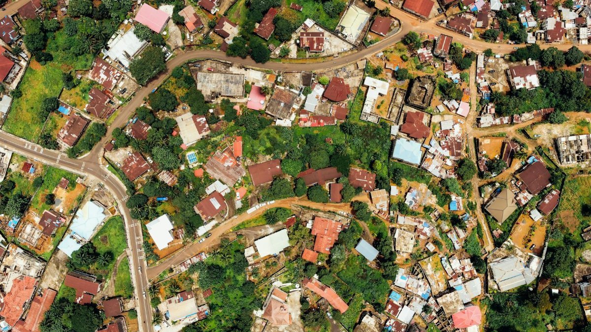 Top-down aerial view showcasing colorful urban landscape with diverse architecture.