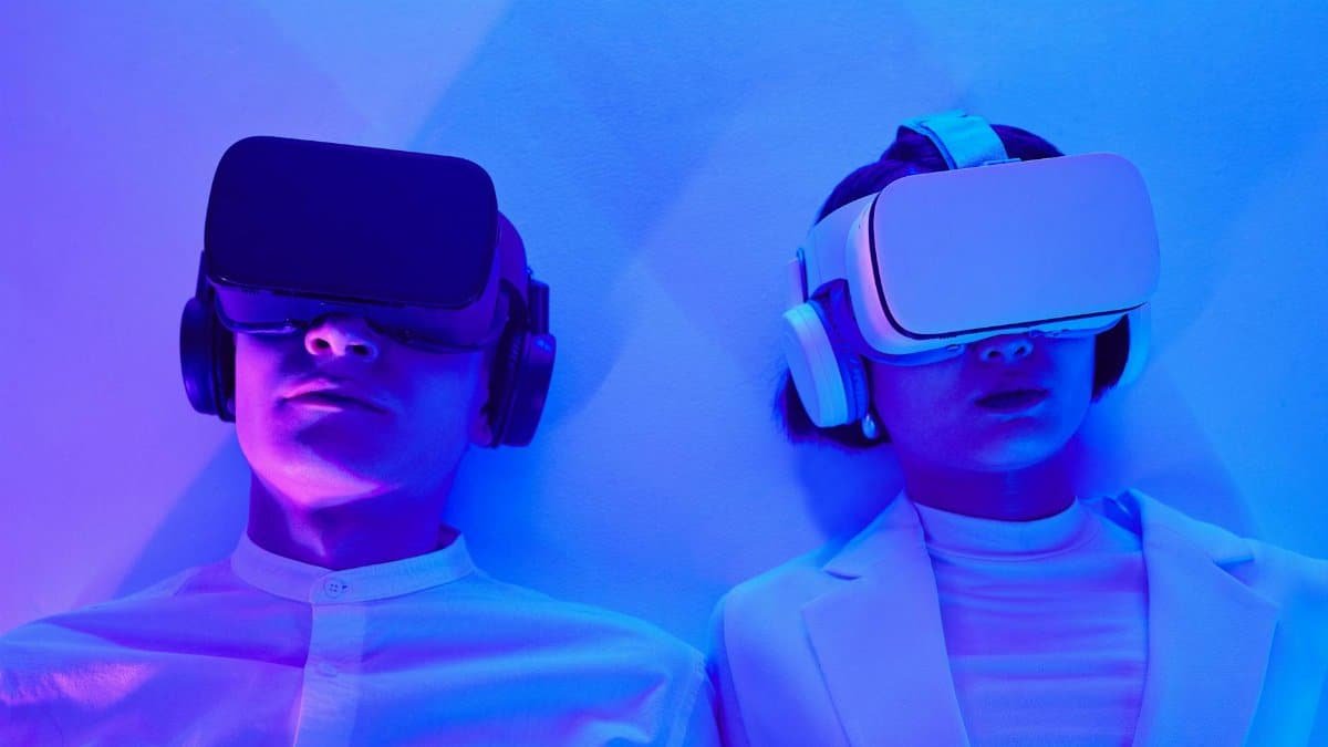 Two people immersed in VR, highlighting future technology and virtual engagement.