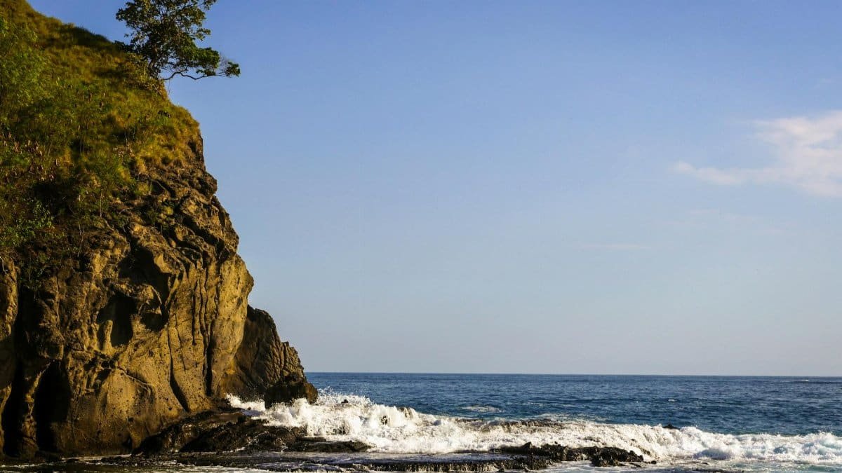 Dramatic cliff and ocean waves in East Nusa Tenggara, Indonesia.