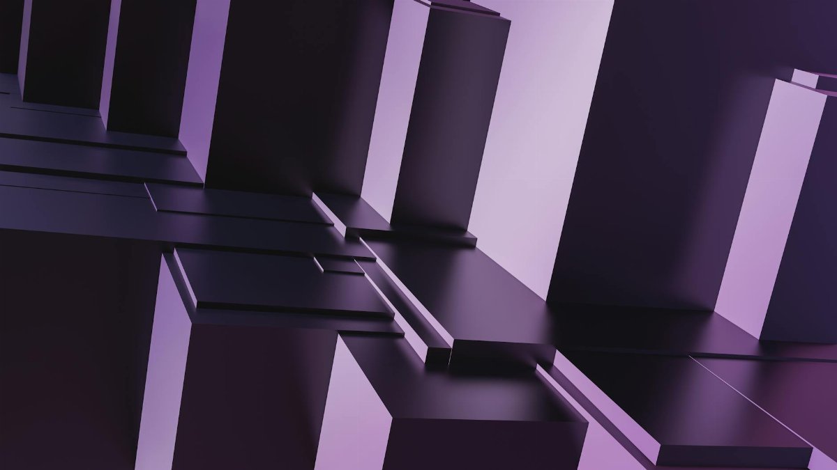 Creative 3D render of overlapping geometric blocks in purple hues.
