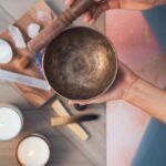 Experience tranquility with a Tibetan singing bowl and meditation setup, enhancing your spiritual practice.
