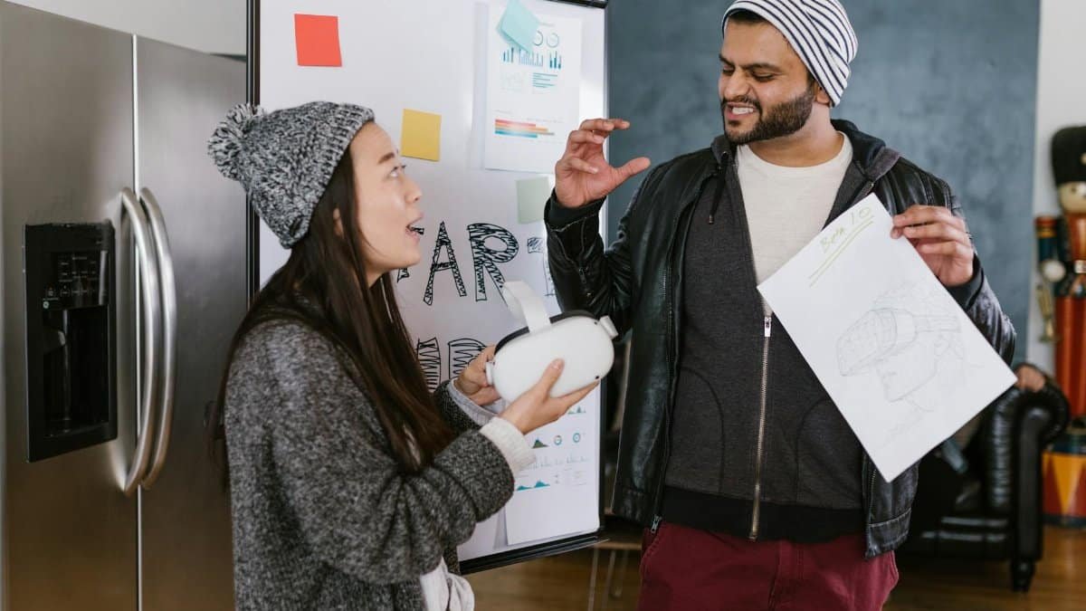 A dynamic team of young entrepreneurs brainstorms VR innovations in a modern workspace.