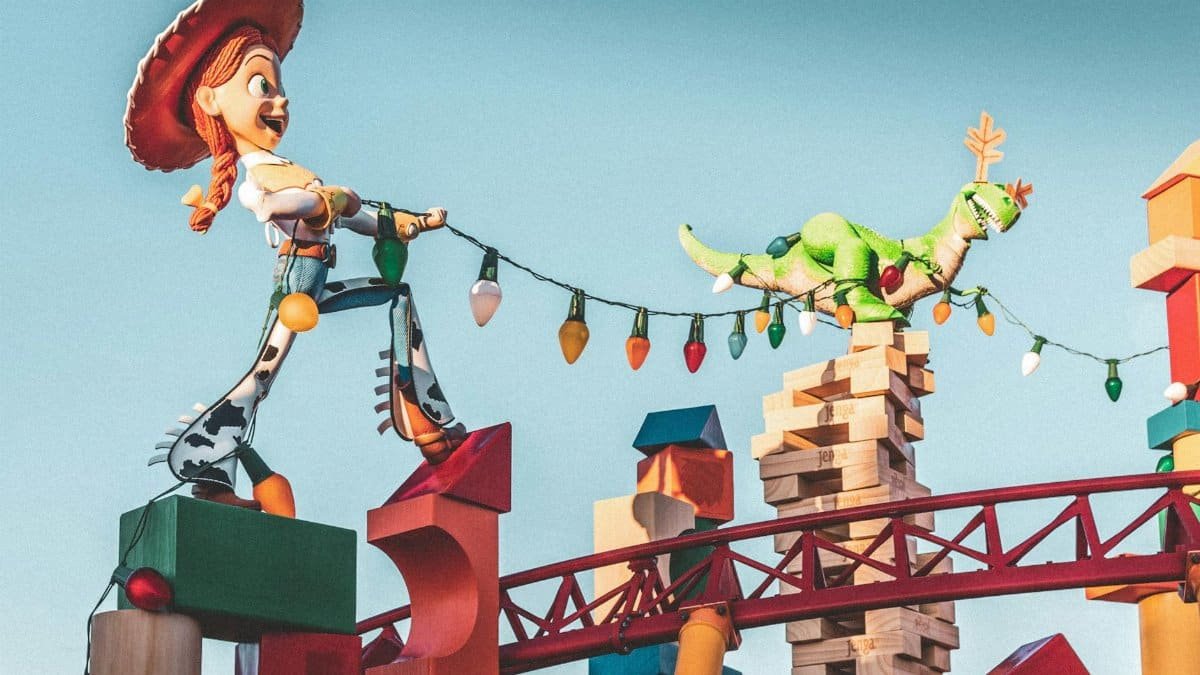 Toy Story characters Jessie and Rex in vibrant scene at Orlando park