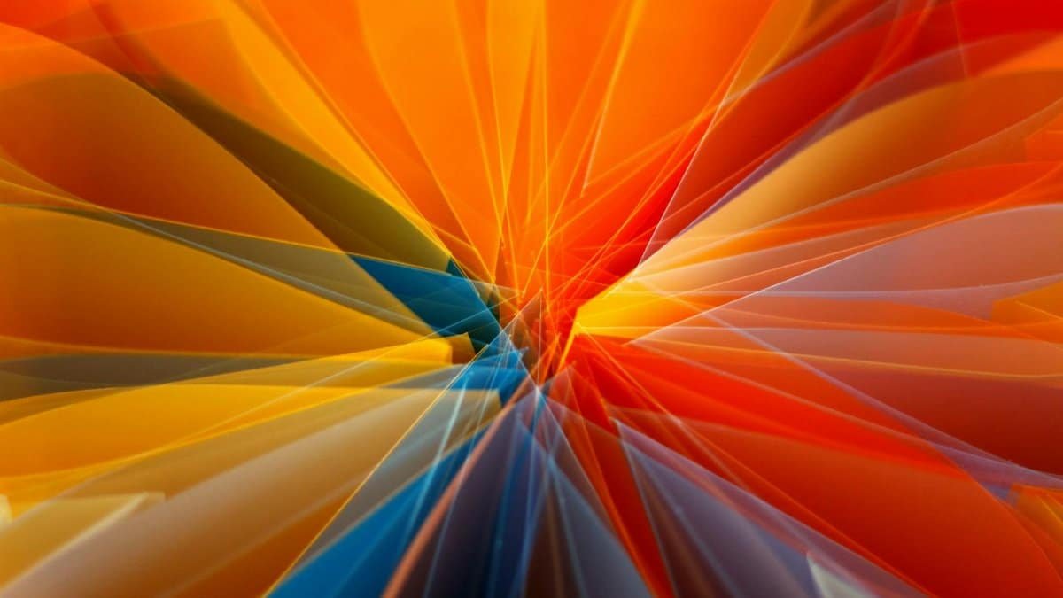 Dynamic abstract art featuring vibrant colors and geometric patterns, creating a sense of movement and energy.