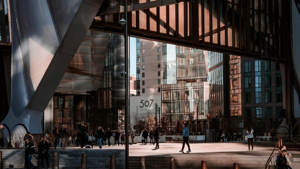 A bustling urban scene showcasing modern architecture and daily life in New York City.