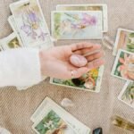 A serene setup of tarot cards and crystals invites insight and introspection.