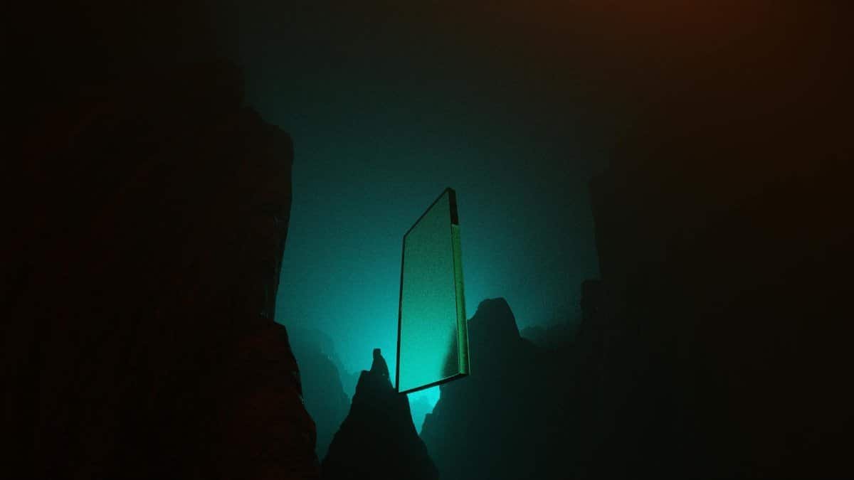 A surreal scene of a floating glass panel illuminated by teal light in foggy, dark mountains.