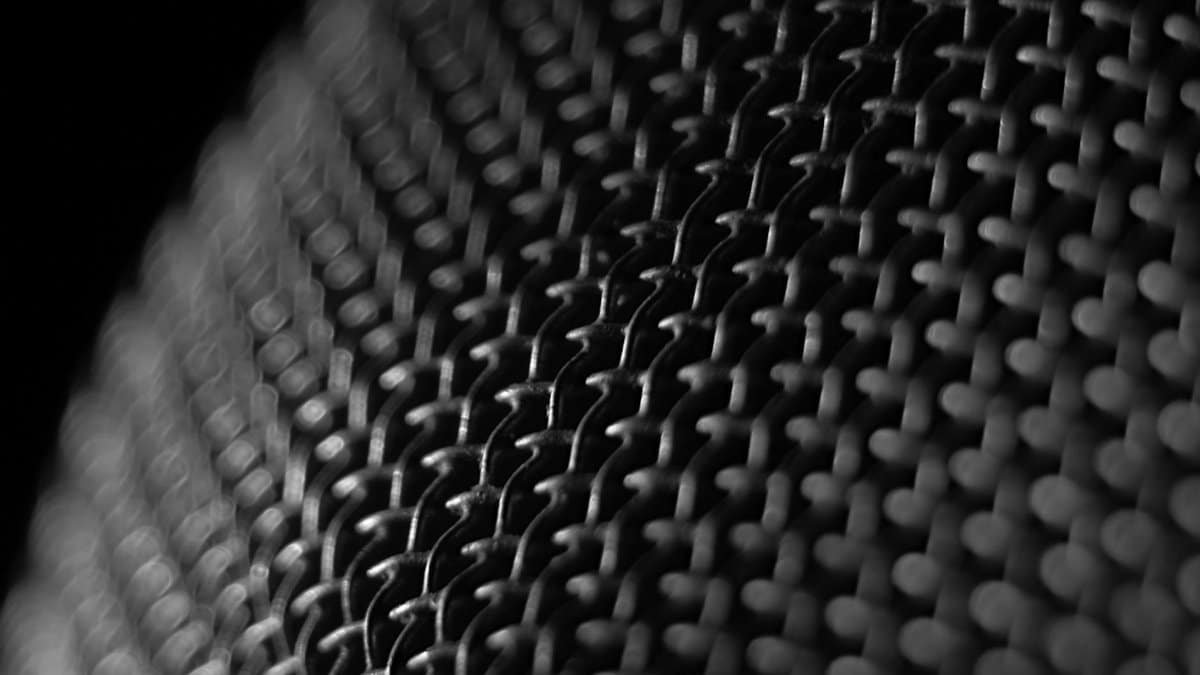 Intricate close-up of a wire mesh pattern showcasing texture and design.