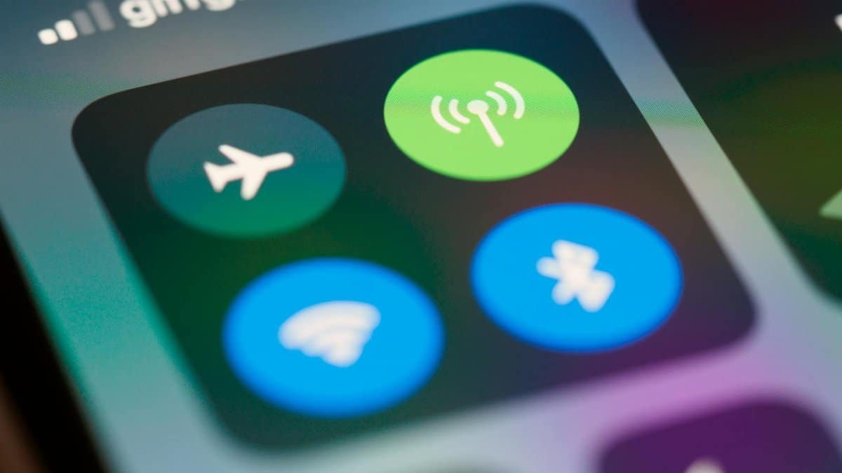 High-resolution close-up of smartphone interface showing control center icons.