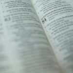 A detailed close-up of a Bible page with a highlighted Psalm, symbolizing faith and spirituality.