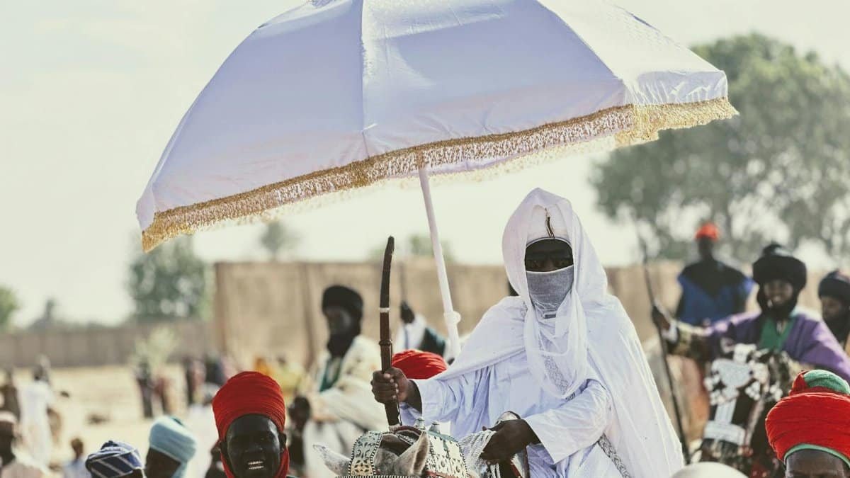 Vibrant traditional African festival with colorful costumes and cultural significance.