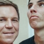 Close-up of father and teenage son posing together, showcasing family resemblance and natural expressions.