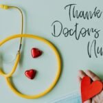 Yellow stethoscope composed with red hearts on white background with thank you doctors and nurses text and medical mask
