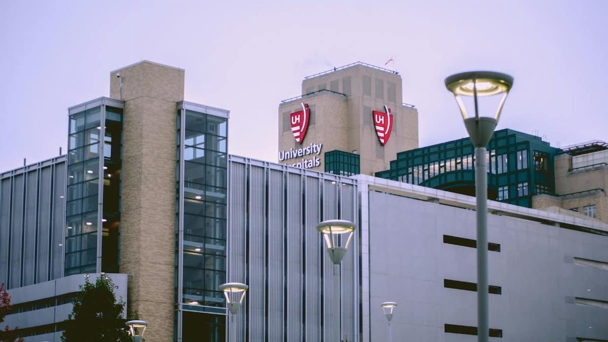 View of University Hospitals building in Cleveland, OH against a clear sky.