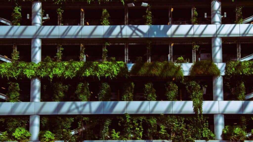 Modern facade with lush vertical garden in Portland, showcasing urban greenery.