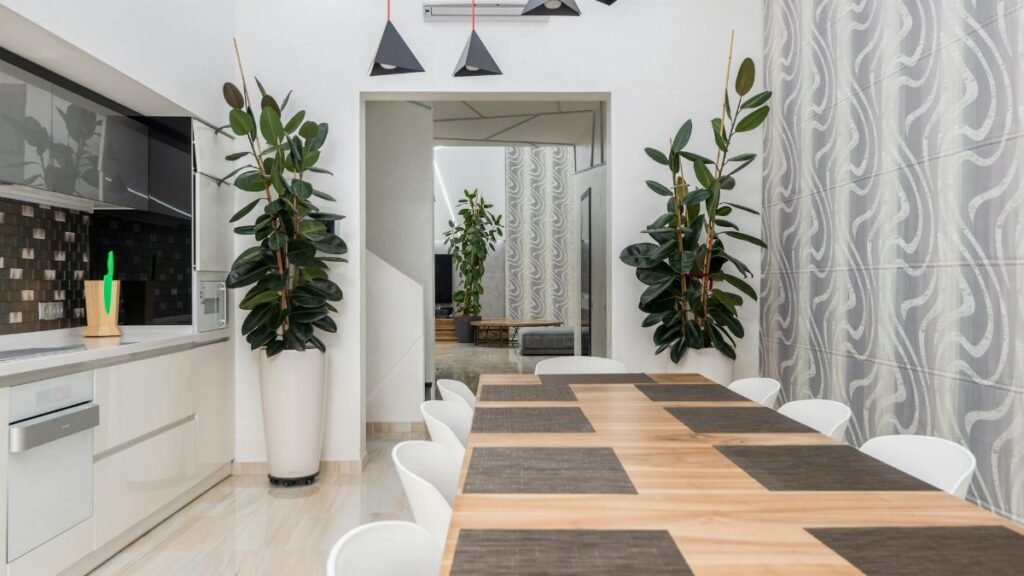 Spacious and stylish dining area with contemporary design and indoor plants.