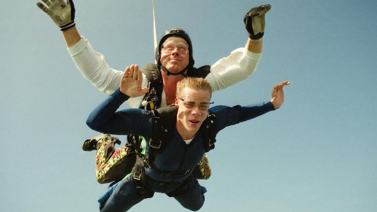 Exhilarating tandem skydiving experience in Baldwin, Wisconsin, captured in mid-air.