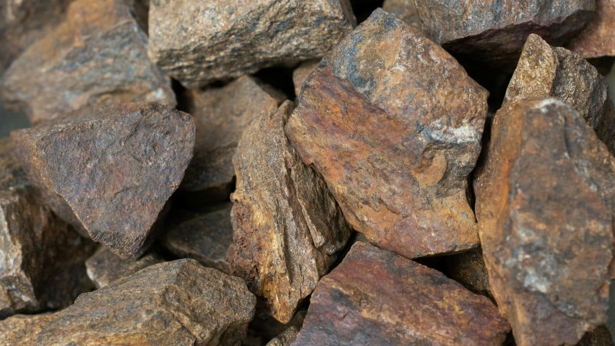 Detailed close-up of rugged brown rocks highlighting natural texture and earthy tones.