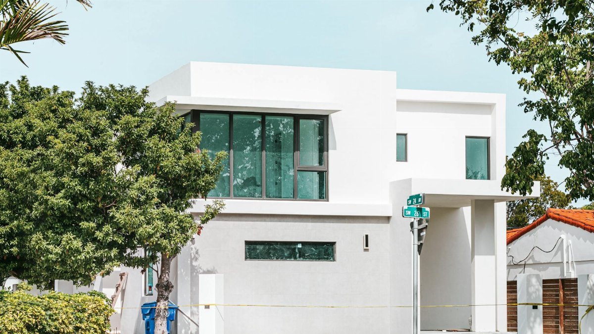 Explore this modern Miami residence with sleek lines and large glass windows.