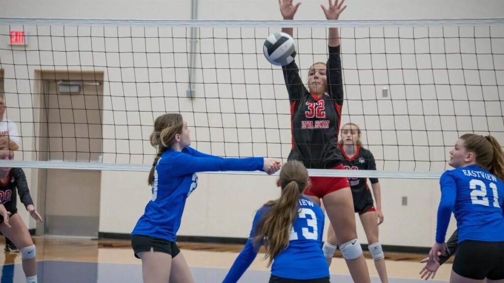 Dynamic volleyball match capturing teamwork and competition in Rochester, MN.