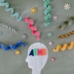 Creative illustration highlighting ADHD awareness with colorful brain imagery.
