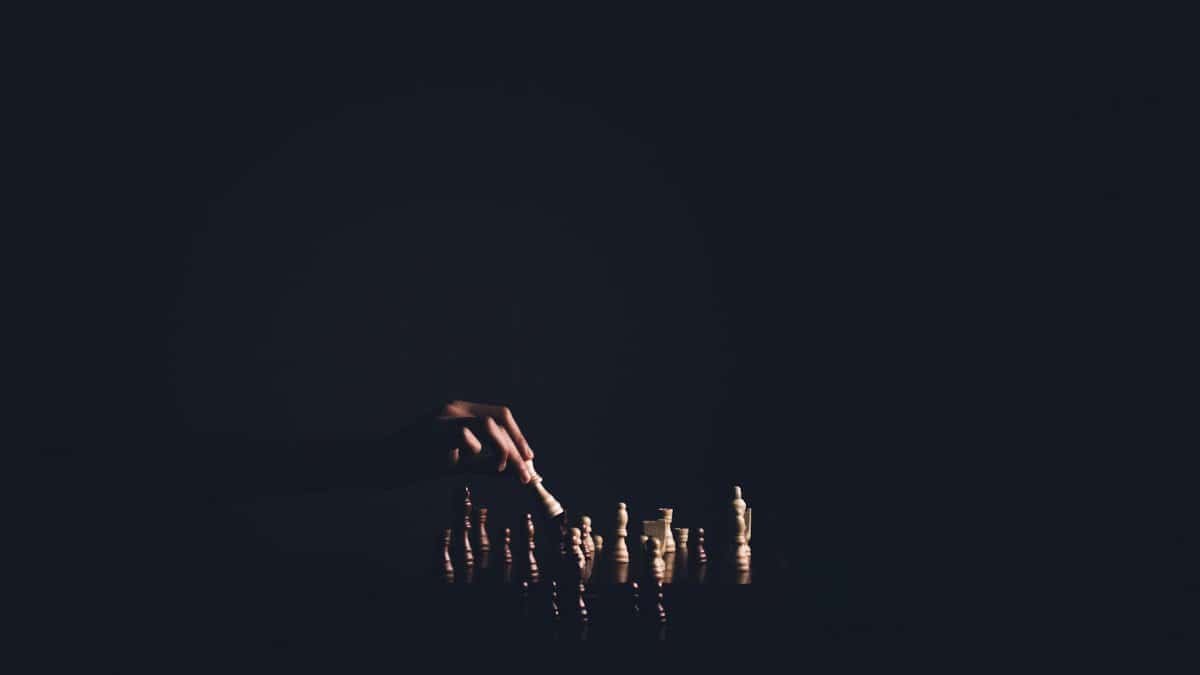 Dark atmospheric chess game showcasing strategic play, emphasizing intelligence and strategy.