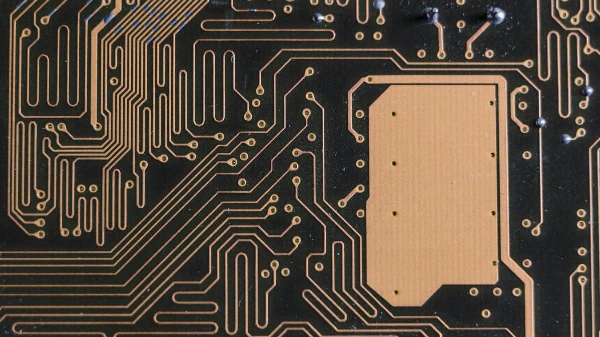 Detailed view of intricate circuit board patterns in technology hardware.