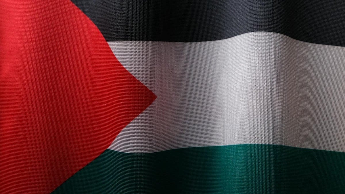 High-resolution close-up of the Palestinian flag showcasing its vibrant colors and textile texture.