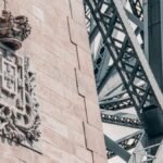 Close-up of the Ponte de Dom Luís I in Porto, showcasing intricate carvings and steel structure.