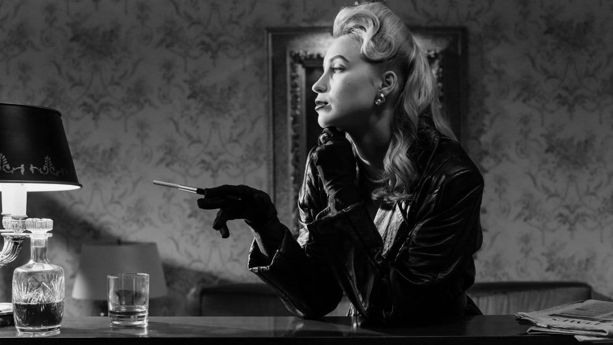 A stylish woman in vintage noir setting with cigarette holder, exuding mystery.