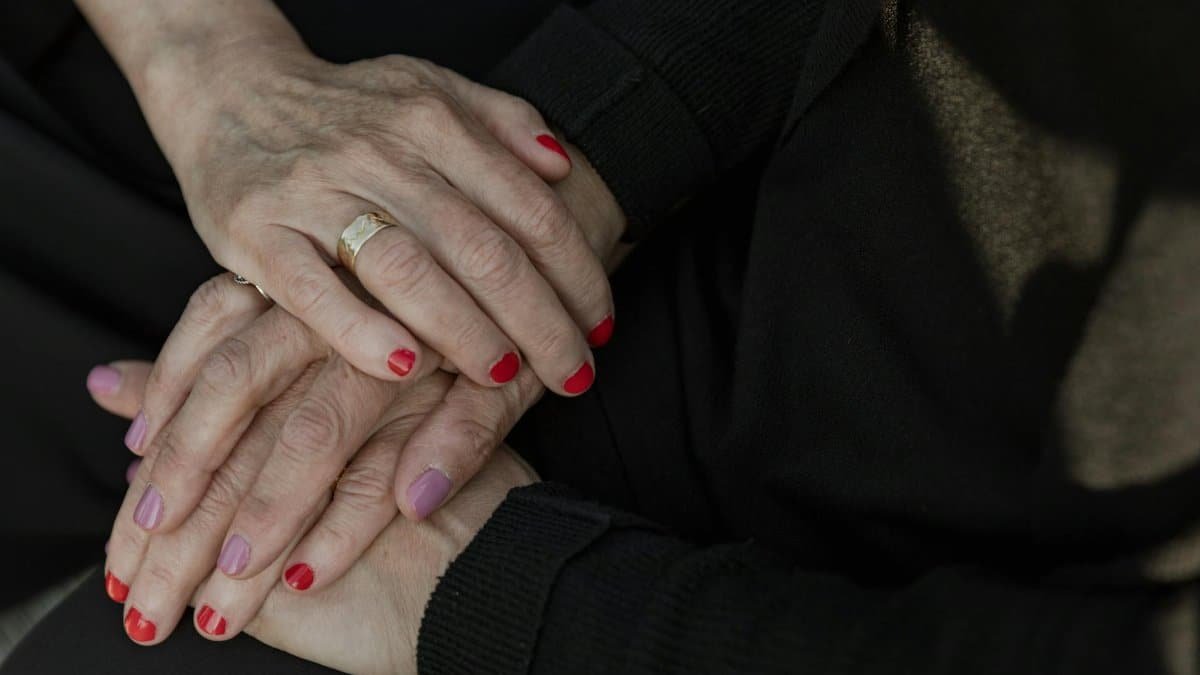 Hands offering support and comfort, representing unity and empathy in times of need.