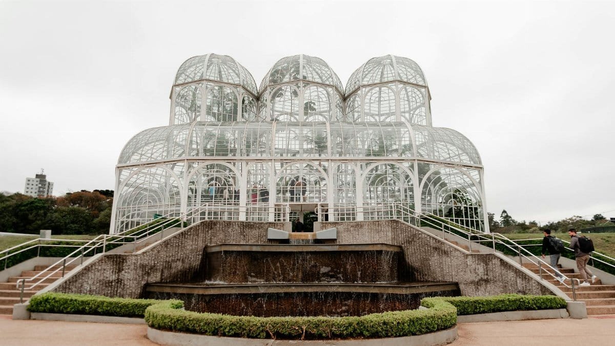 Elegant glasshouse architectural landmark in a botanical garden, Curitiba.