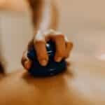 Close-up of cupping therapy on a person's back, focusing on relaxation and wellness.