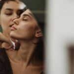 A tender moment captured between a couple showcasing love and intimacy.