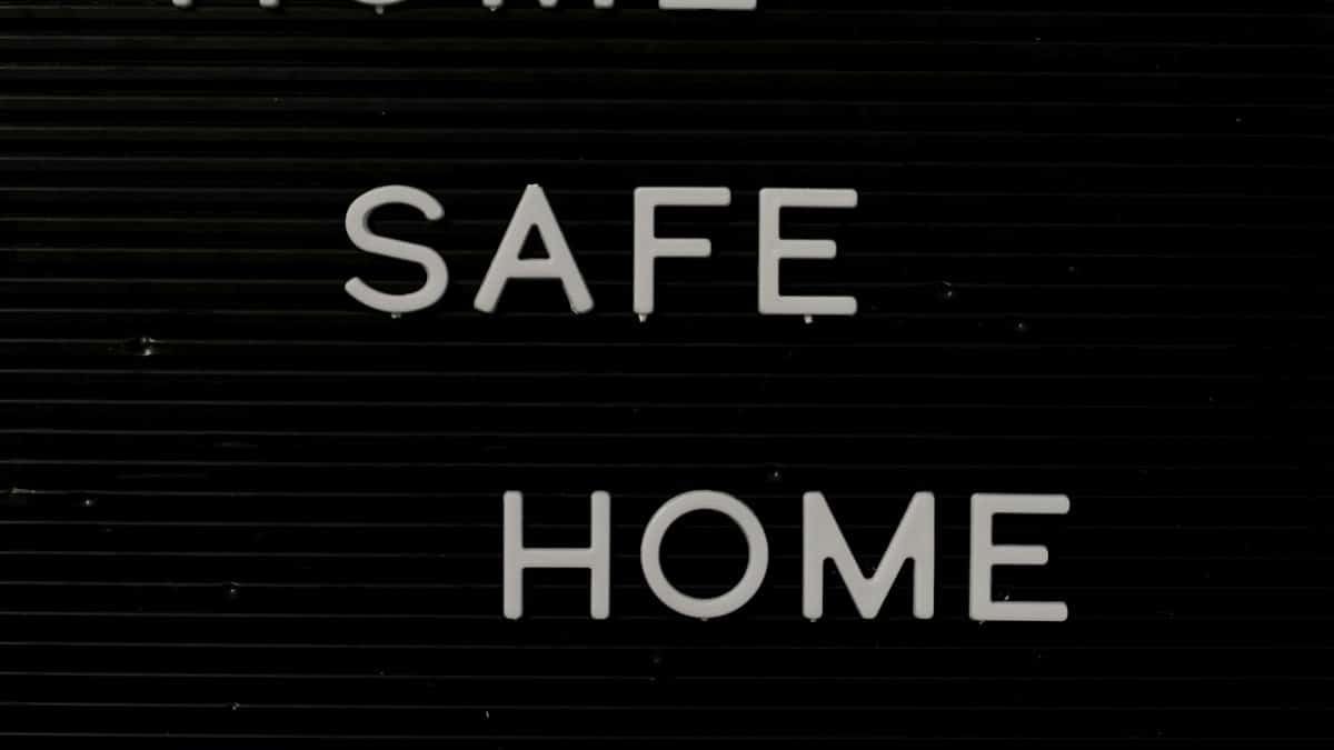 Home Safe Home sign on a letter board reflecting safety and coziness.
