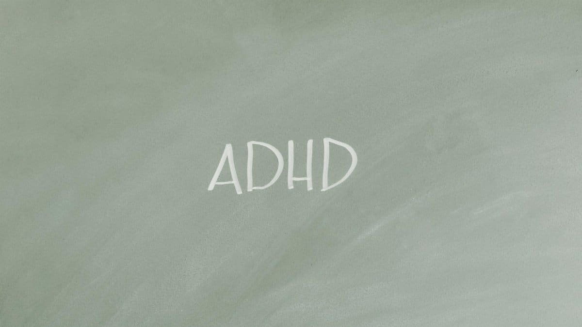 Simple illustration highlighting ADHD awareness with text on a gray background.