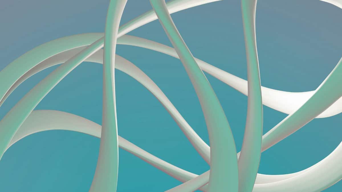 Abstract twisting shapes on a gradient background creating an artistic and modern feel.