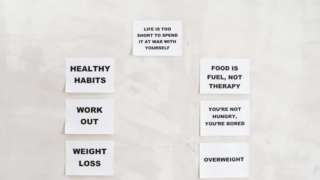 Minimalist display of motivational health and wellness quotes emphasizing healthy habits and weight management.