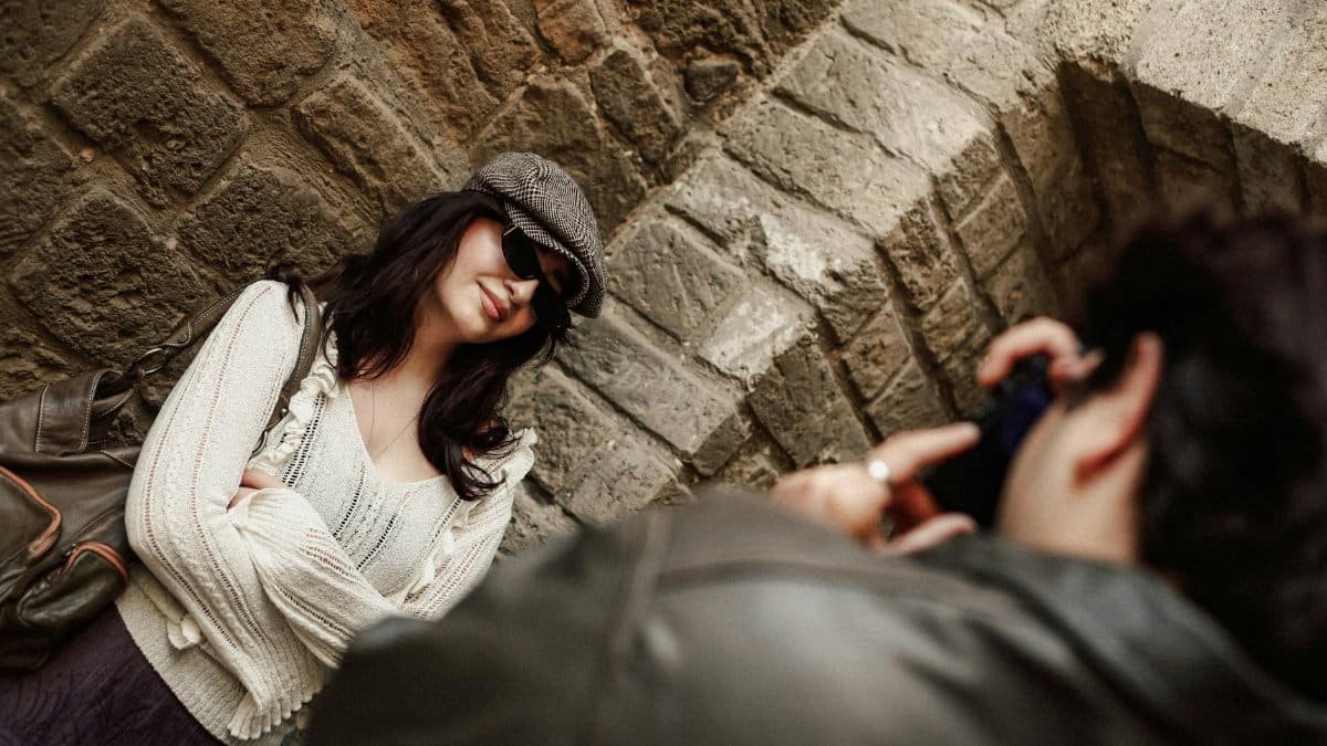 Candid shot of a woman posing in an urban setting in Baku, Azerbaijan.