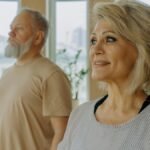 Senior couple at a wellness studio enjoying yoga and relaxation indoors.