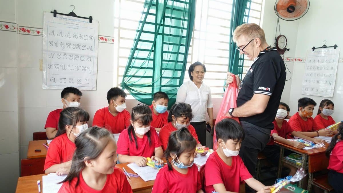 A vibrant classroom scene in Ho Chi Minh City with children learning eagerly.