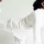 A yogi performing a balanced yoga pose, showcasing calm and concentration.