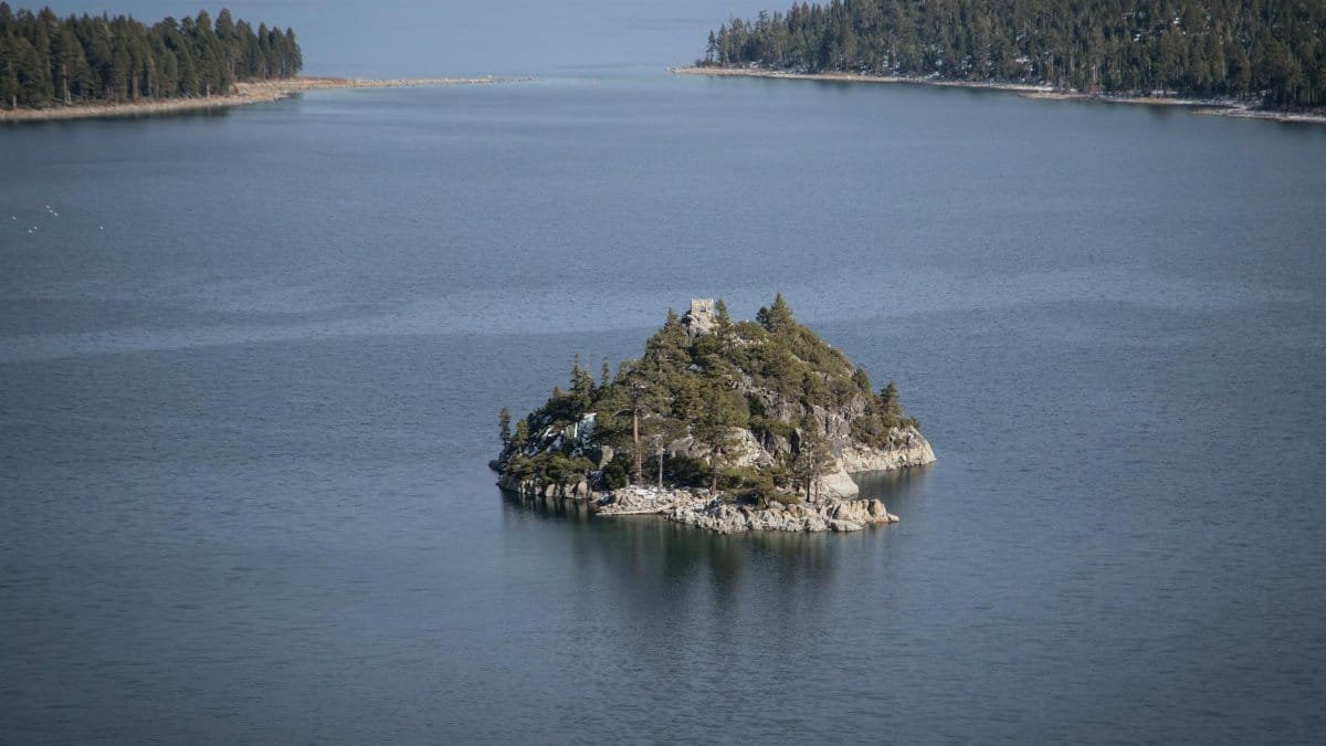 Scenic view of Fannette Island in Lake Tahoe's Emerald Bay on a clear day.