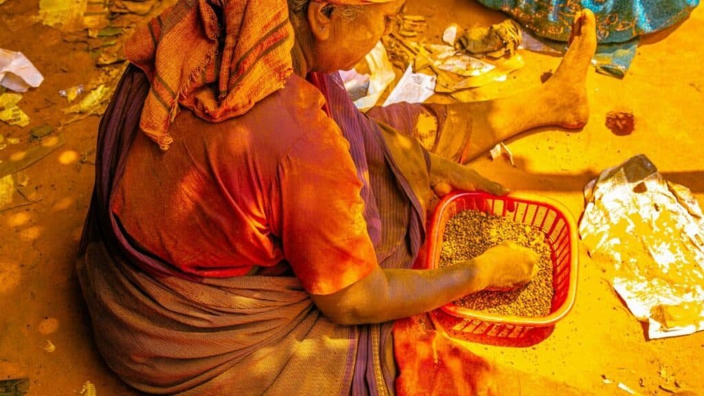 A vibrant depiction of daily life during a festival in Kodungallur, India. Captures cultural attire and activities.