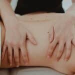 Close-up of a relaxing massage therapy session focusing on back treatment and stress relief.